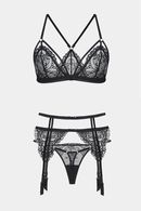 Lingerie set: bra with soft cup, thong panties and garter belt